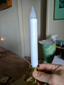 The candle, now powered by 3V.