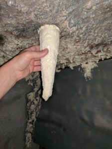 Stick your stalactite to the ceiling of your cave